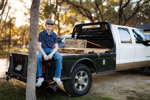Senior portrait in a barn